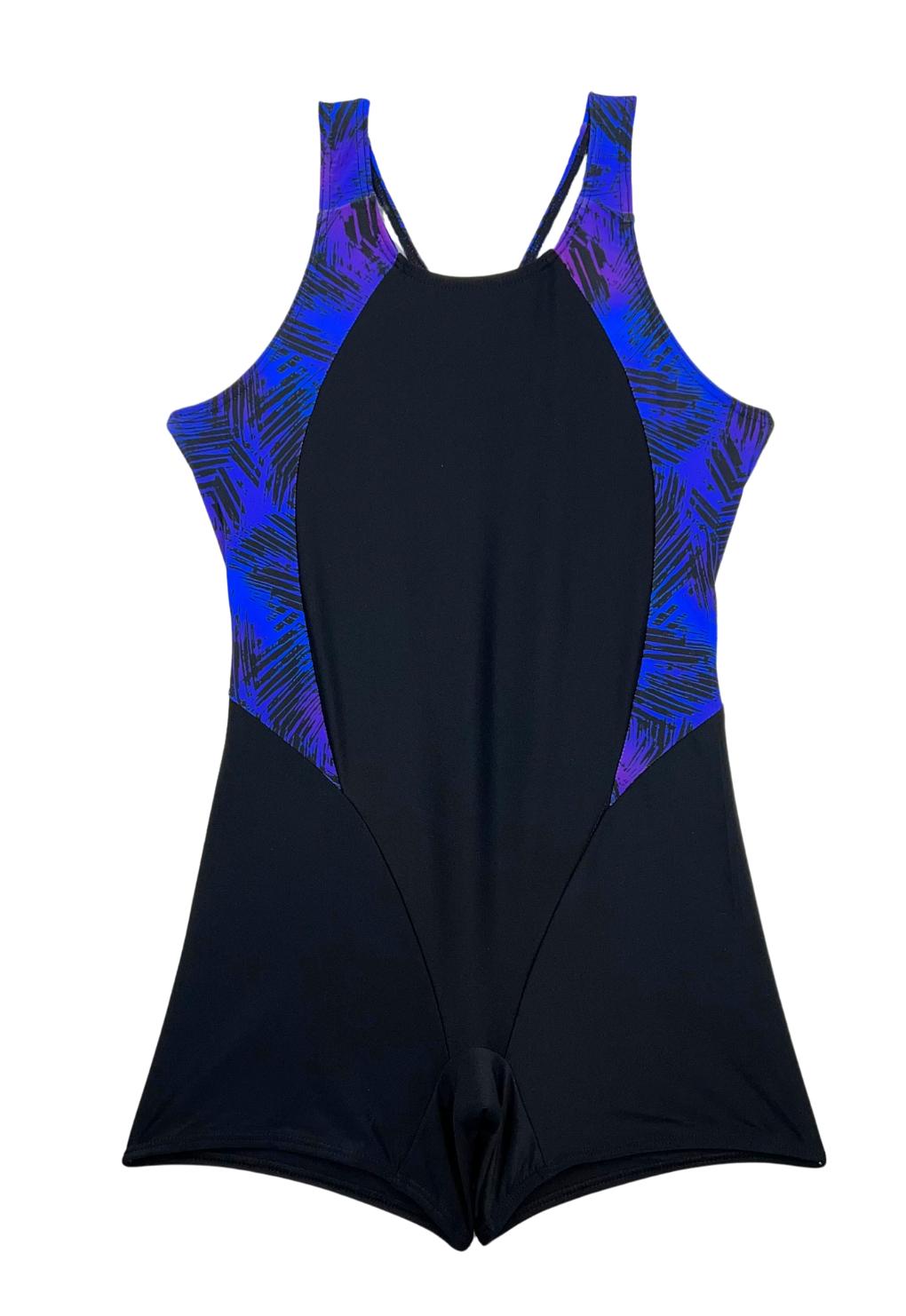 Enterito niña pierna corta estampado morado