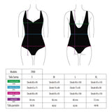 Swimsuit with circular detail and orange print